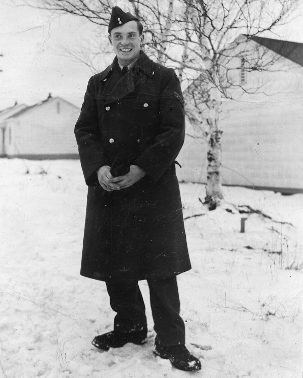 RAF servicemen standing in snow