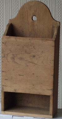 small wall-hanging plain wooden box