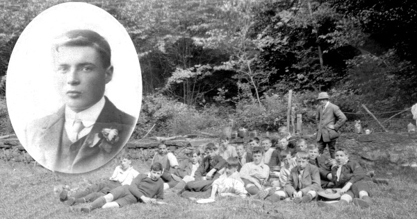 scouts laying on ground with inset portrait of scoutmaster